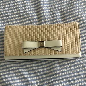 Kate Spade Tan raffia bow clutch